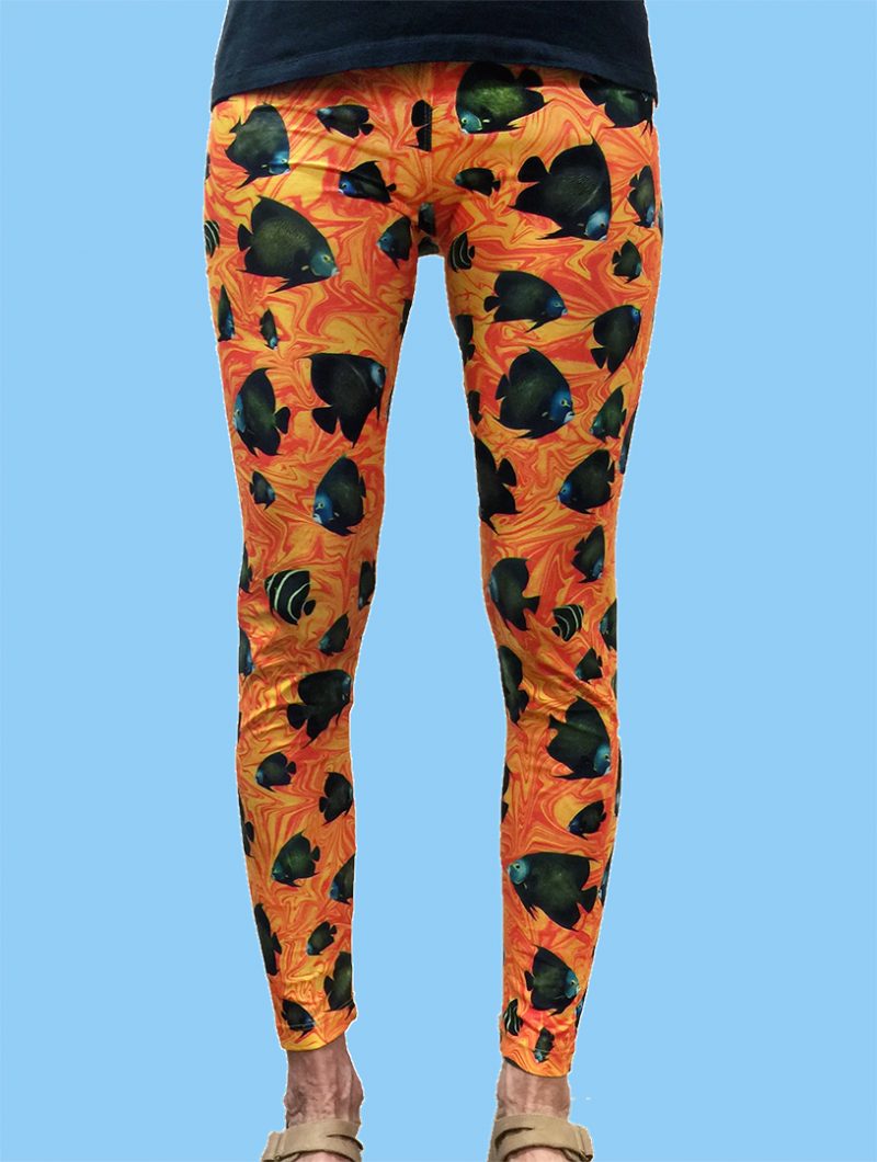 ladies leggings with french angelfish over a very colorful orange swirl background