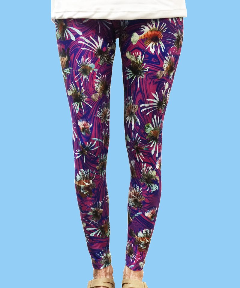 ladies leggings with tropical lionfish with a purple ocean background