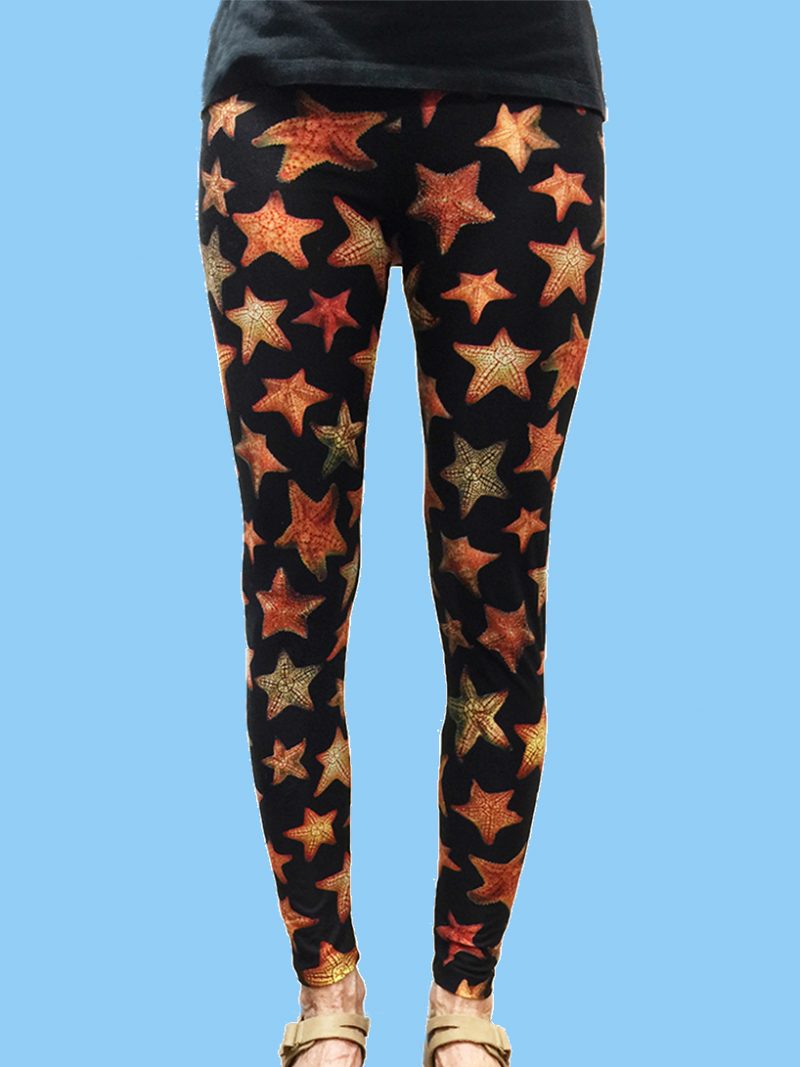 ladies leggings black background with numerous starfish photos