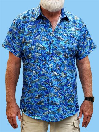Men's dress shirt with many different photos of tarpon on a blue ocean swirl background