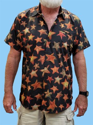 Men's dress shirt with many different pictures of starfish over the entire shirt on a black background